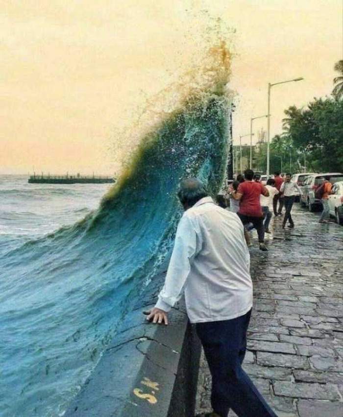 волна накрывает людей
